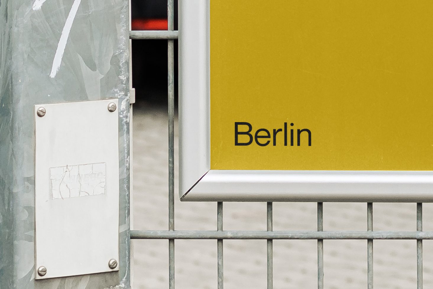 City sign mockup with the word Berlin in minimalist font, urban environment, designer asset for branding and location-based graphics.